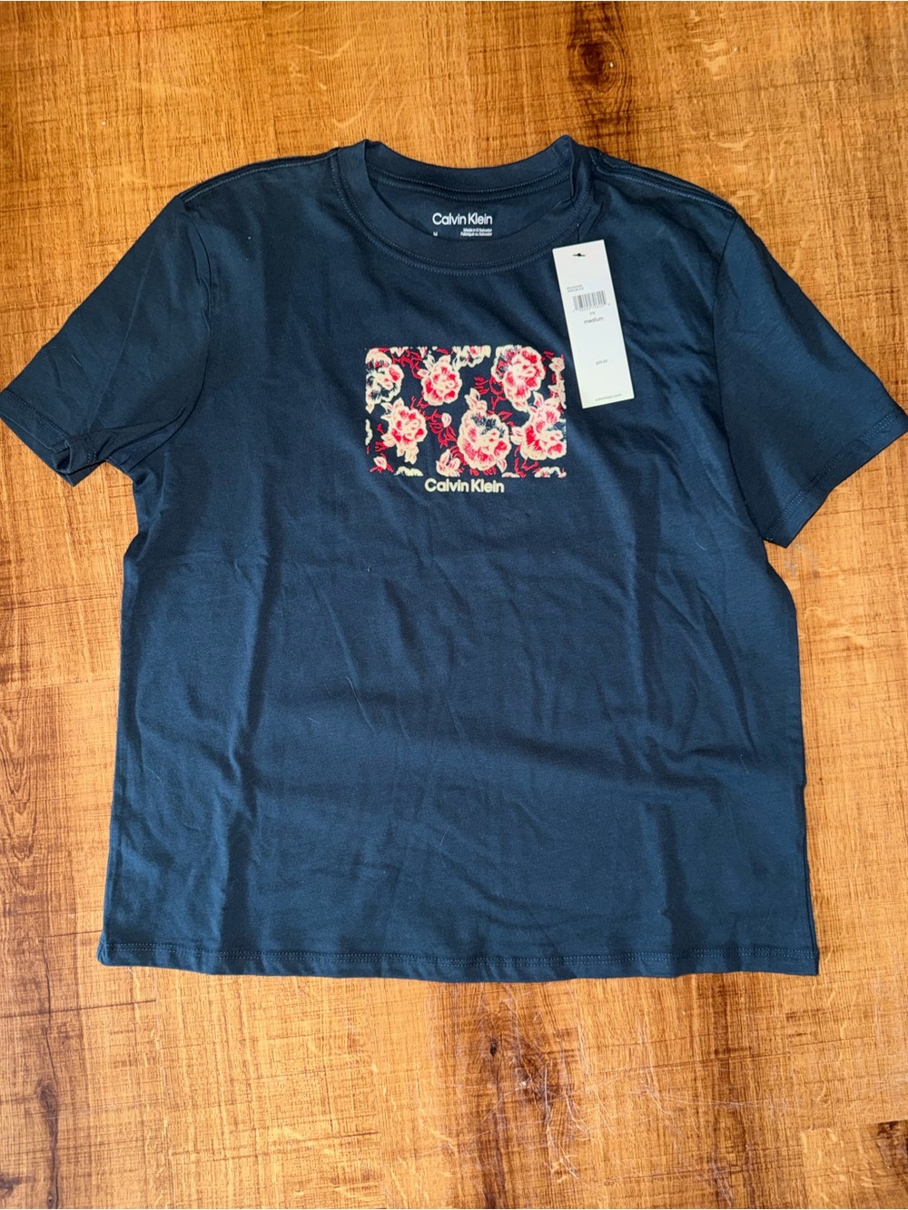 NWT Calvin Klein Navy Short Sleeve Tee with Floral Chest Design